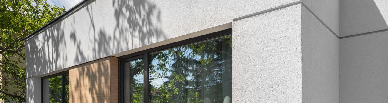 Баумит фасадна изолация – избор между бял и графитен стиропор